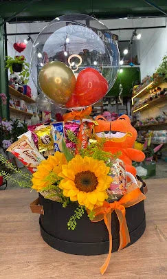 Cestas românticas do Rancho das Plantas com flores, chocolates e detalhes artesanais, perfeitas como presentes personalizados para celebrar o amor.