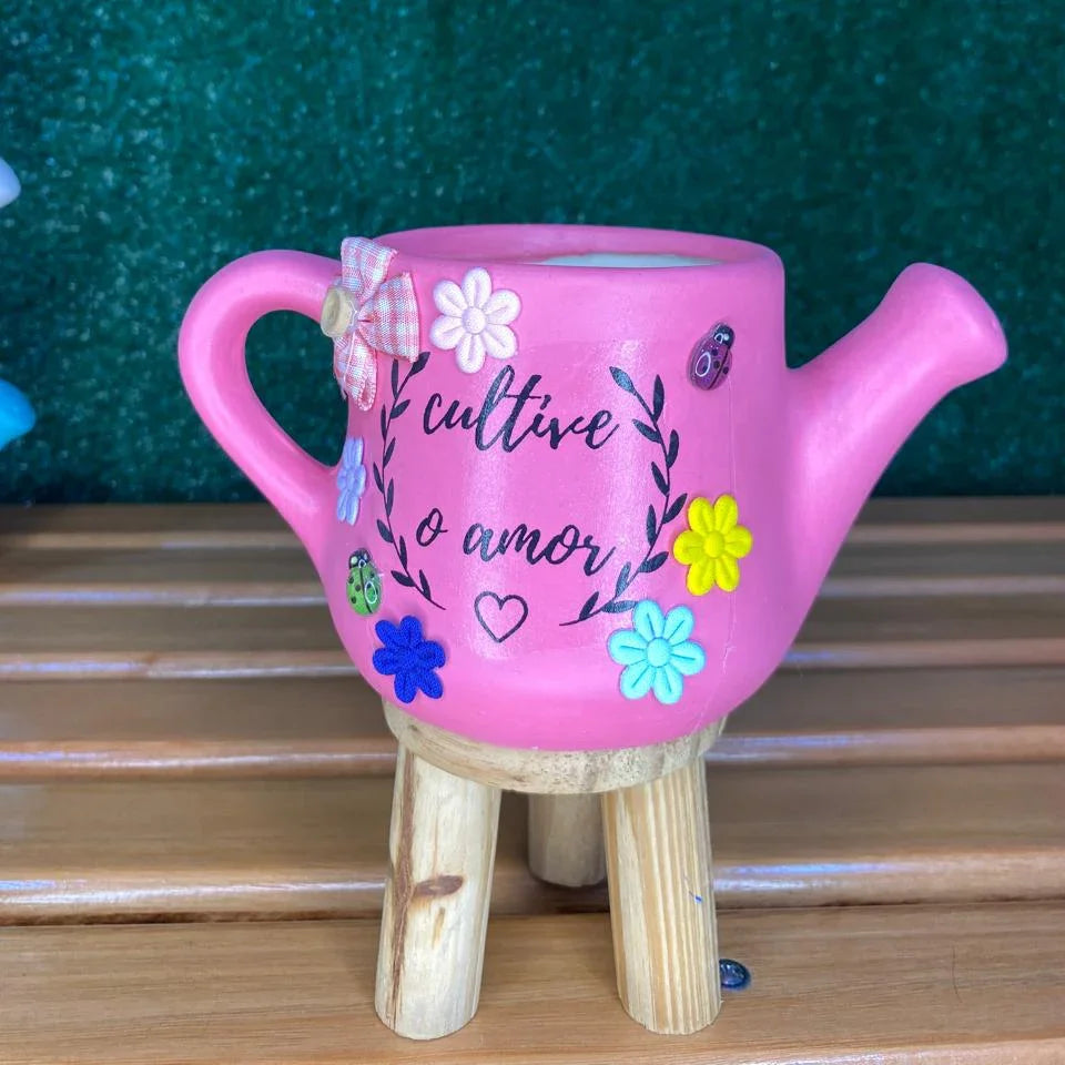 Vaso regador rosa com frase inspiradora, feito em cerâmica artesanal para ambientes delicados. Vasos de Plantas - Flores e Presentes - Floricultura Rancho das Plantas em São Paulo